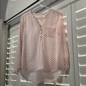 White top with small pink flowers